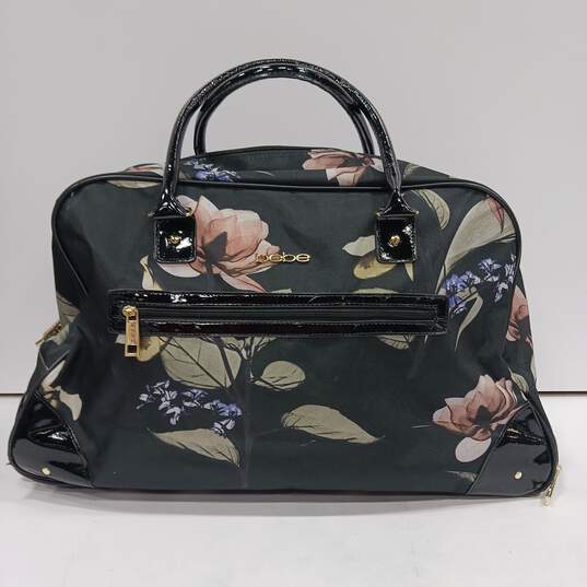 Bebe Rolling Duffle Carry On Bag Floral Design image number 1