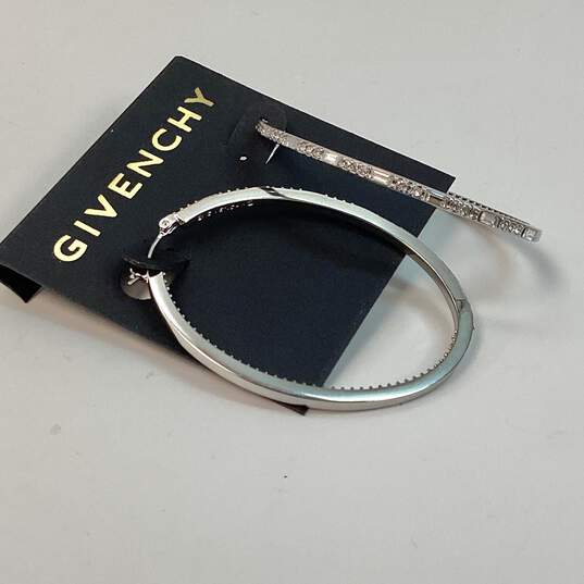 Designer Givenchy Silver-Tone Crystal Cut Stone Fashionable Hoop Earrings image number 1