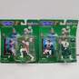 Pair of Starting Lineup Football Action Figures In Sealed Packaging image number 1