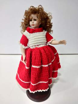 Porcelain Doll w/ Red Knit Dress & Wooden Stand