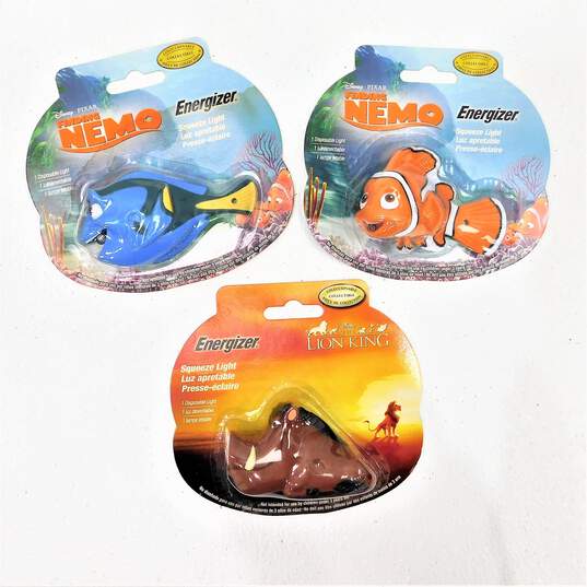 Sealed Disney Energizer Squeeze Light Finding Nemo, Dory & Lion King Pumbaa image number 1
