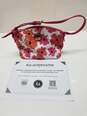 AUTHENTICATED Dooney and Bourke Pink and Orange Floral Patterned Crossbody Bag image number 1