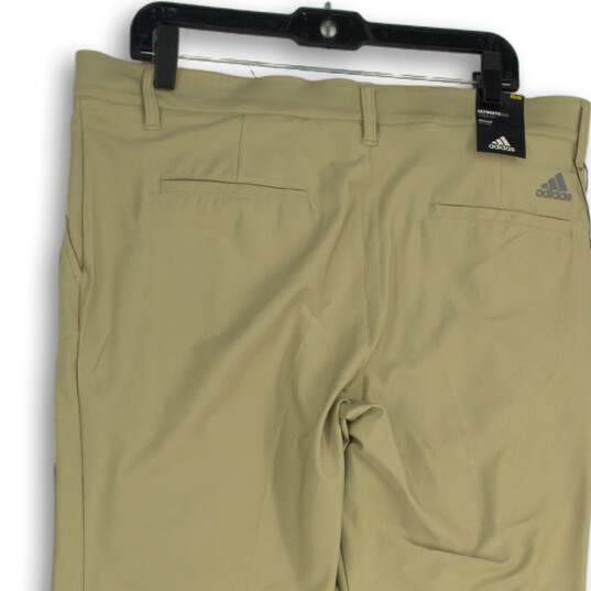 NWT Mens Tan Flat Front Slash Pocket Ultimate Classic Golf Chino Pants Sz 35x32 image number 4