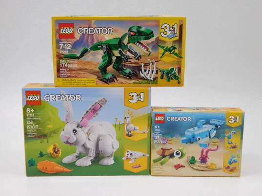 Creator Factory Sealed Sets 31058 Dino 31133 Rabbit & 31128 Dolphin & Turtle image number 1