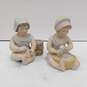 Pair of Ceramic Figurines of Children image number 1