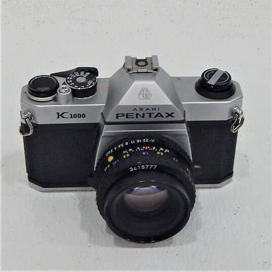Pentax K1000 SLR 35mm Film Camera W/ Lenses Flash Manuals Case image number 2