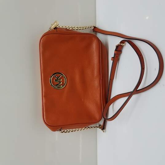 Buy the Michael Kors Orange Crossbody Bag | GoodwillFinds