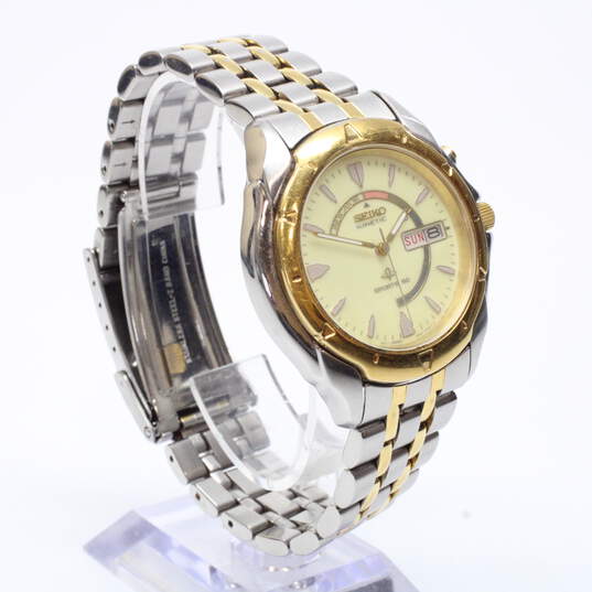 Buy the Vintage Seiko Kinetic Sports 50 Two Tone Stainless Steel Watch (5M43 -0B19) | GoodwillFinds