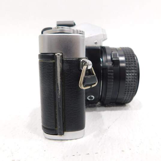 Minolta XG-9 35mm SLR Film Camera w/ 2 Lenses, Flash & Neck Strap image number 6