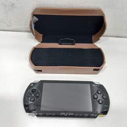 Black Sony PSP w/ Brown Leather Case