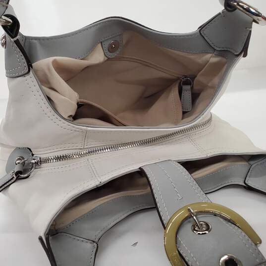 Moderate wear with some scuffs and scratches.  Coach Soho Lynn Soft White Leather Gray Trim Hobo Shoulder Bag image number 7