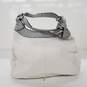 Moderate wear with some scuffs and scratches.  Coach Soho Lynn Soft White Leather Gray Trim Hobo Shoulder Bag image number 3
