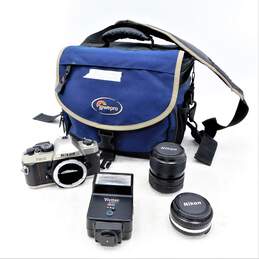 Nikon FM10 SLR 35mm Film Camera With Lenses Flash & Case