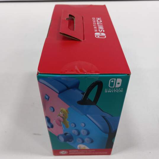 Nintendo Switch Super Mario Bros Controller image number 4