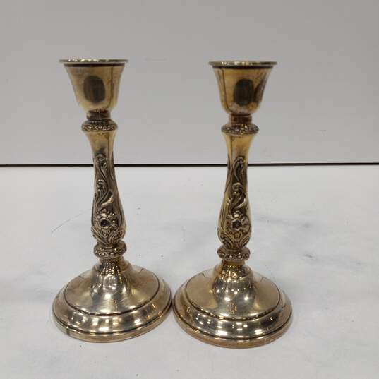 PAIR OF SILVERPLATED CANDLE STICKS image number 1
