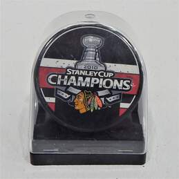 Chicago Blackhawks Unsigned 2010 Stanley Cup Champions Logo Hockey Puck w/ Protective Case