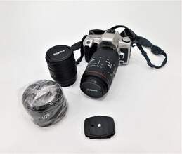Minolta Maxxum XTsi 35mm Film Camera w/ 2 Sigma Lenses & Case