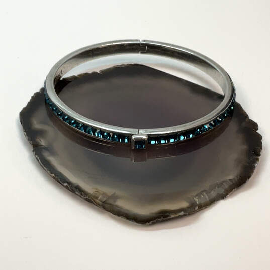 Designer Henri Bendel Silver-Tone Blue Rhinestone Hinged Bangle Bracelet image number 1