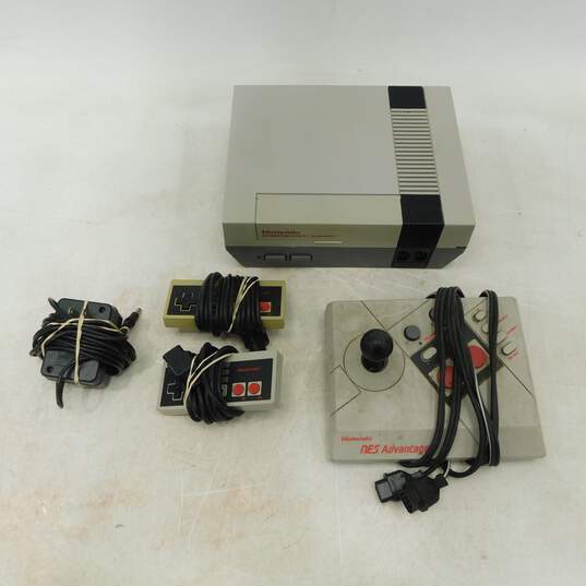 Nintendo NES Console w/ Controllers + Wires image number 1