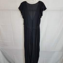 Free People black v neck relaxed fit short sleeve jumpsuit XS alternative image