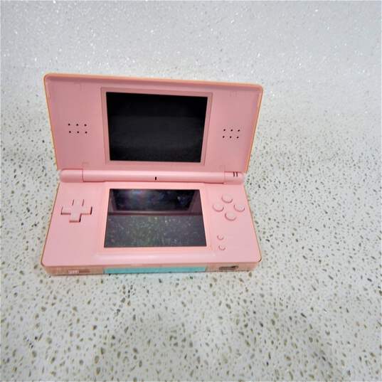 Nintendo DS Lite W/ Four Games Smart Girl's Magical Book Club image number 2