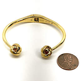 Designer Kate Spade Gold-Tone Hinged Knot Adjustable Cuff Bracelet alternative image