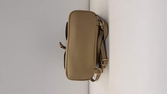 Buy the Nanette Lepore Beige Faux Leather Crossbody Bag | GoodwillFinds