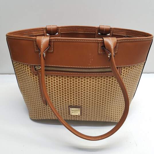 Buy the Dooney & Bourke Camden Woven Leather Tote Bag Brown