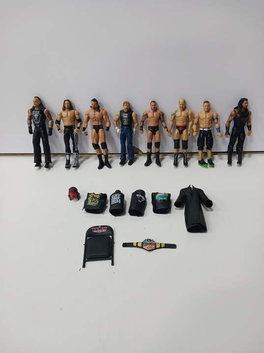 Lot of 8 Assorted WWE Wrestling Action Figures & Accessories image number 1