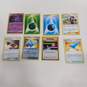 Lot of Assorted Pokemon Trading Cards In Tin image number 2