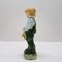 Porcelain Young Boy with Overalls and Hat Figurine image number 4
