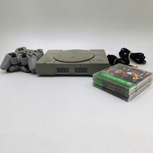 Sony PlayStation w/4 Games and 2 controllers image number 16