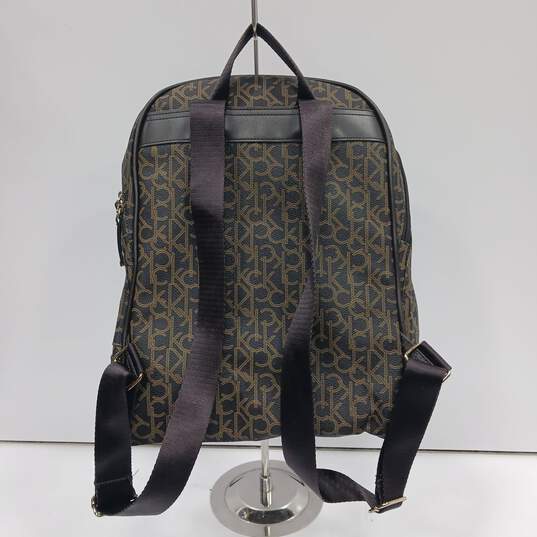 Calvin Klein Brown Monogram Faux Leather Backpack image number 2