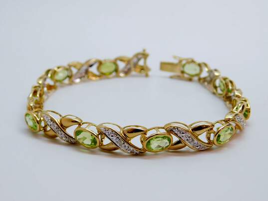 14K Yellow Gold Oval Peridot 0.10 CTTW Diamond Crossover Tennis Bracelet 11.4g image number 1