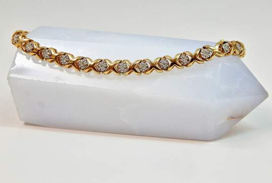 10K Yellow Gold 0.45 CTTW Diamond XO Tennis Bracelet 8.3g image number 1