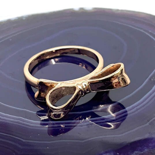 Designer Kate Spade Gold-Tone Ribbon Knott Classic Mini Bow Band Ring image number 2