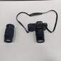 Canon T50 Camera & Lens w/ Strap image number 1