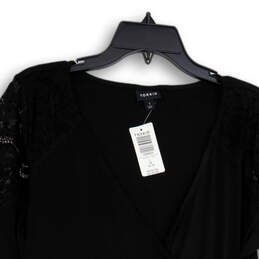 NWT Womens Black V-Neck Lace Long Sleeve Wrap Tunic Top Size 14-16