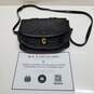AUTHENTICATED Dooney & Bourke Vintage Black Leather Convertible Satchel Crossbody Bag image number 1