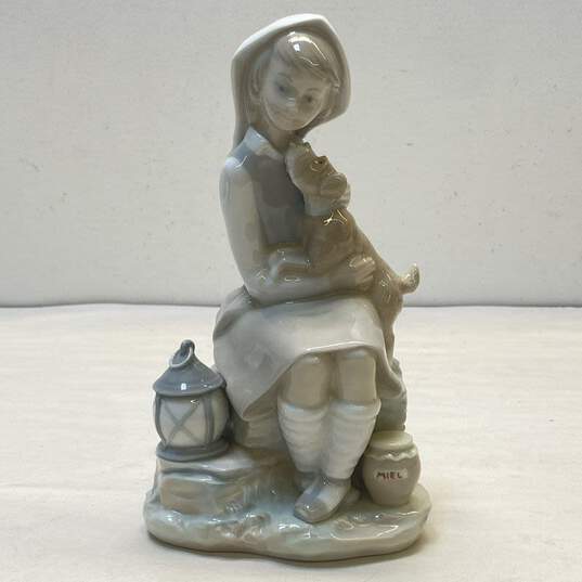 Lladro Porcelain Figurine Sitting By Lantern Girl and Puppy Ceramic Art image number 1