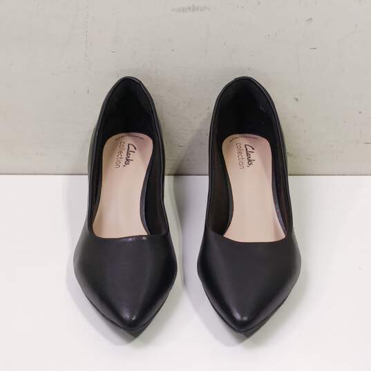 Ladies Black Wedge Heels Size 8.5 image number 1