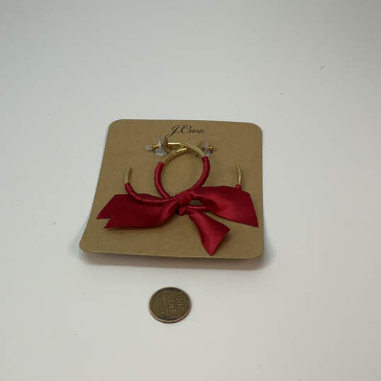 Designer J. Crew Gold-Tone Red Ribbon Wrapped Fashionable Hoop Earrings image number 3