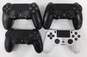 4 Used Sony Dualshock 4 Controllers image number 1