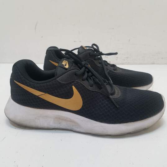 Nike Tanjun Black, Gold Sneakers 812655-004 Size 11 image number 1