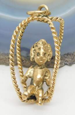 14K Gold Unique Child Baby Figural Rope Wire Swing Pendant 5.8g alternative image