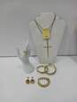 Bundle of Faux Gold Tone & Purple Costume Jewelry image number 1