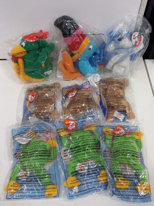Bundle of Assorted Fast Food & Cereal Box Toys image number 4