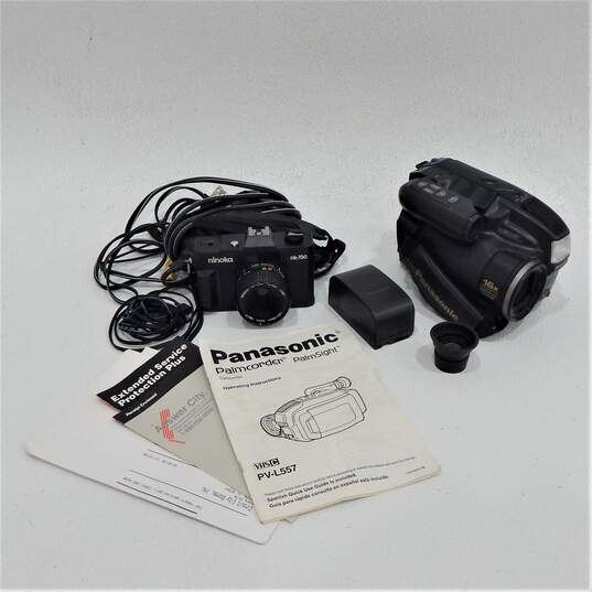 Panasonic PalmSight PV-L557 VHS-C Handheld Video Camera W/ Manuals & Accessories & Ninoka NK-700 W/ 50mm Lens image number 1