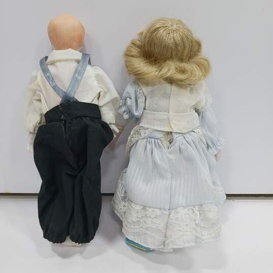 Bundle of Vintage Boy & Girl Porcelain Dolls image number 2