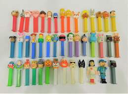 Assorted Vintage PEZ Candy Dispensers Charlie Brown Star Wars Muppets Holiday